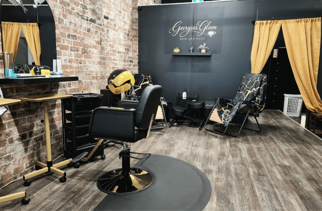 Hair styling stations inside Georgia's Glam, a full-service hair and nail salon on King Street.