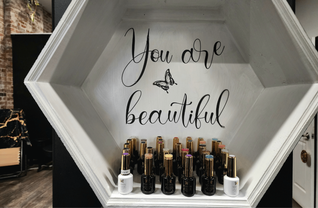 Nail products and beauty display inside Georgia's Glam salon in Uptown Saint John.